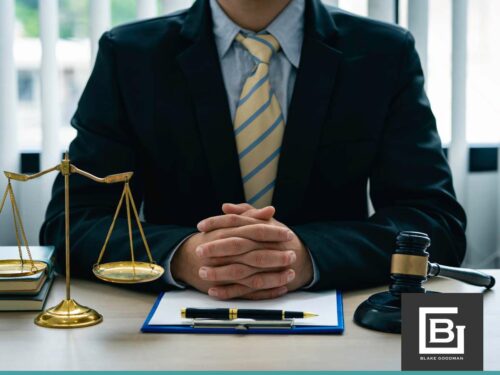 A lawyer with a gavel and scales of justice, symbolizing debt relief solutions for clients seeking financial recovery