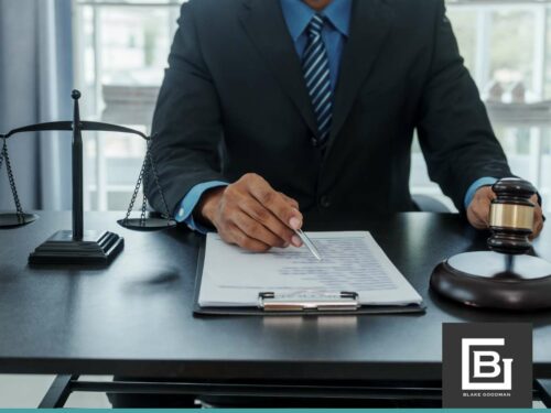 A lawyer reviewing documents with a gavel and scales of justice, representing solutions for medical debt relief through bankruptcy